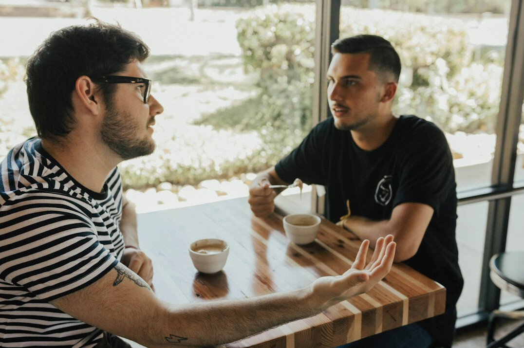 two people having deep conversation