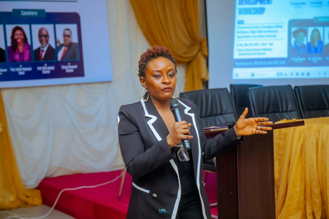 woman presenting at conference