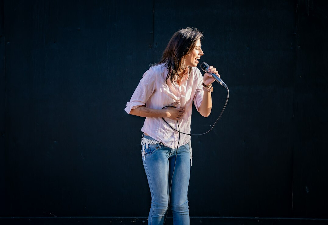 person speaking confidently on stage