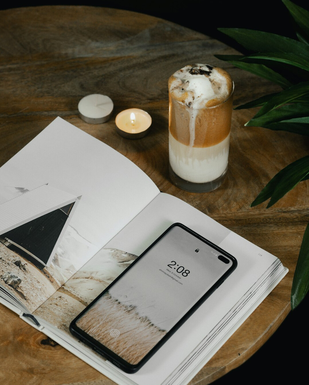 Journal and cup of coffee on a table